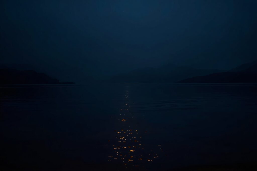 Illustration of a misty lake at night, representing the Loch Ness Monster mystery